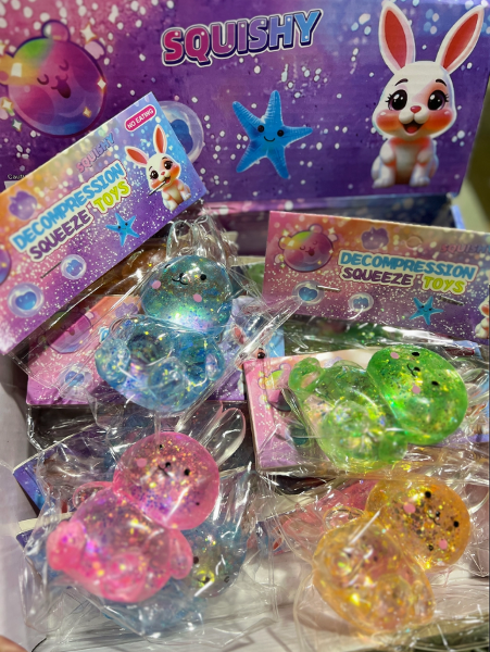 Fidget Toys - Sugar Squeeze Glitter Bunny Squishy; $9.99