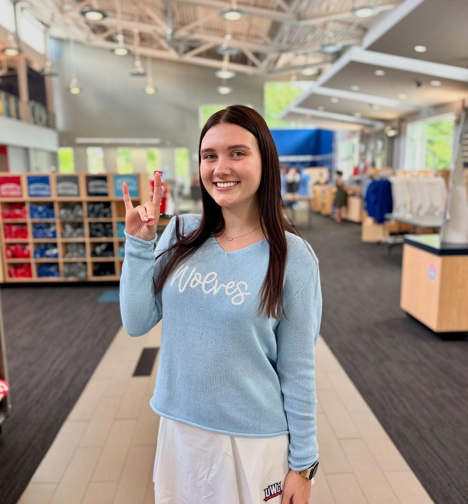 image of: V-NECK WOLVES TEXT SWEATER