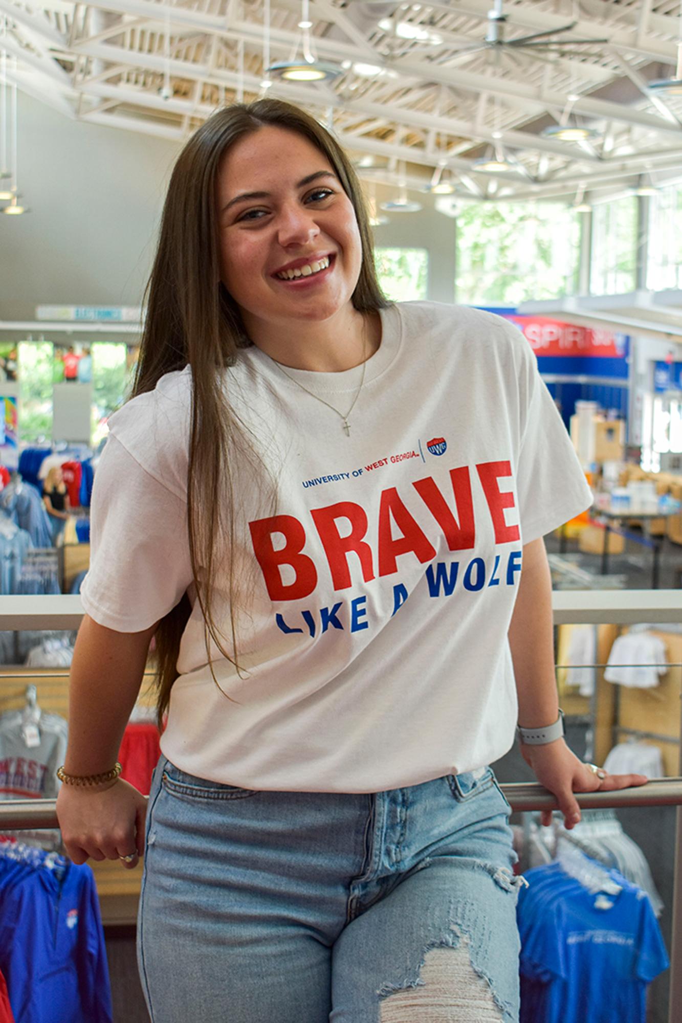 image of: BRAVE LIKE A WOLF T-SHIRT UWG SHIELD LOGO