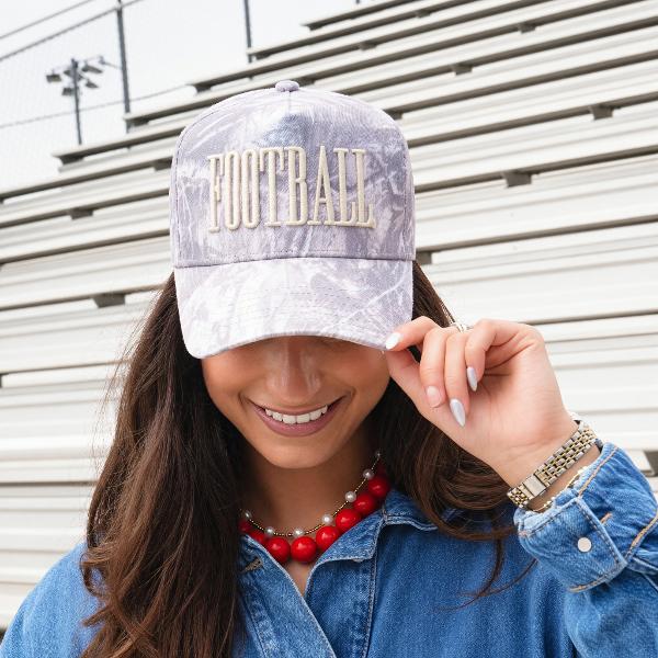 KenzKustomz Football Camo Hat; $40.00