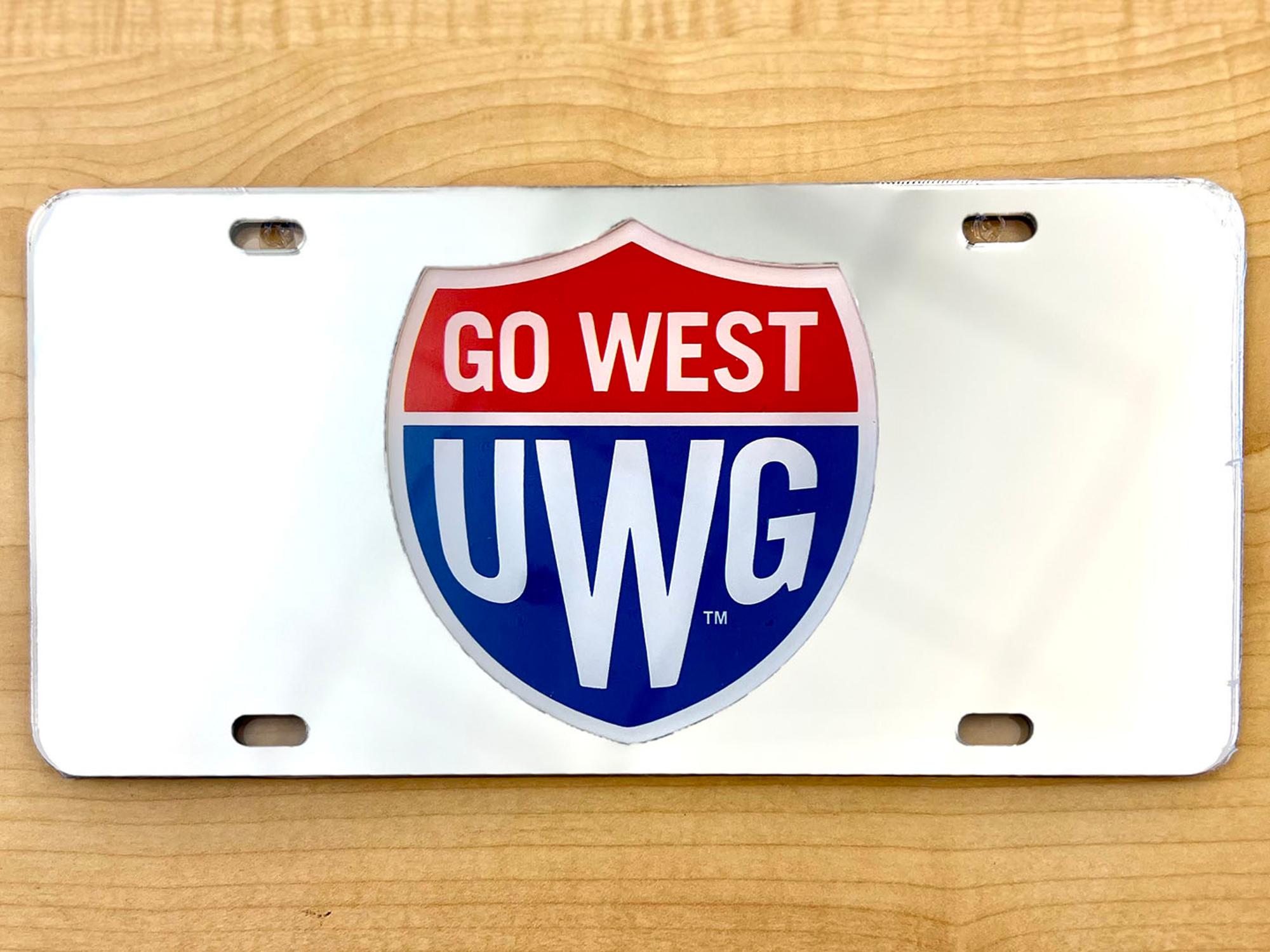 image of: GO WEST SHIELD EMB LICENSE PLATE