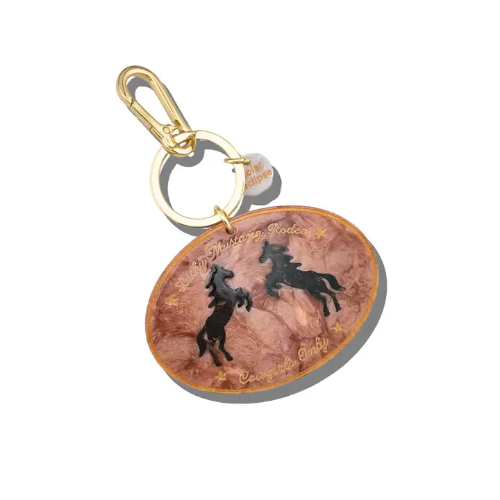 Product image 1 of 1 for Solar Eclipse Hand-Painted Lucky Rodeo Bag Charm + Keychain