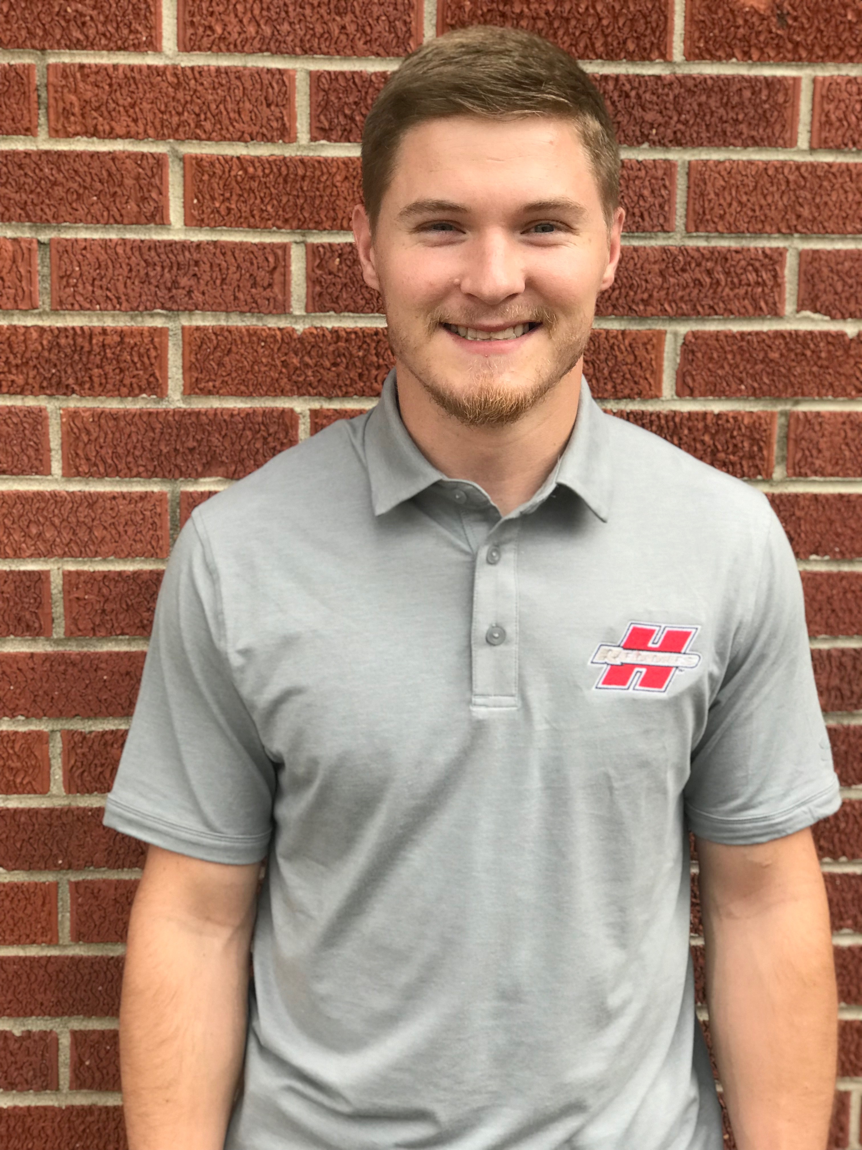 image of: Henderson Reddies Charged Cotton Logo Short Sleeve Polo