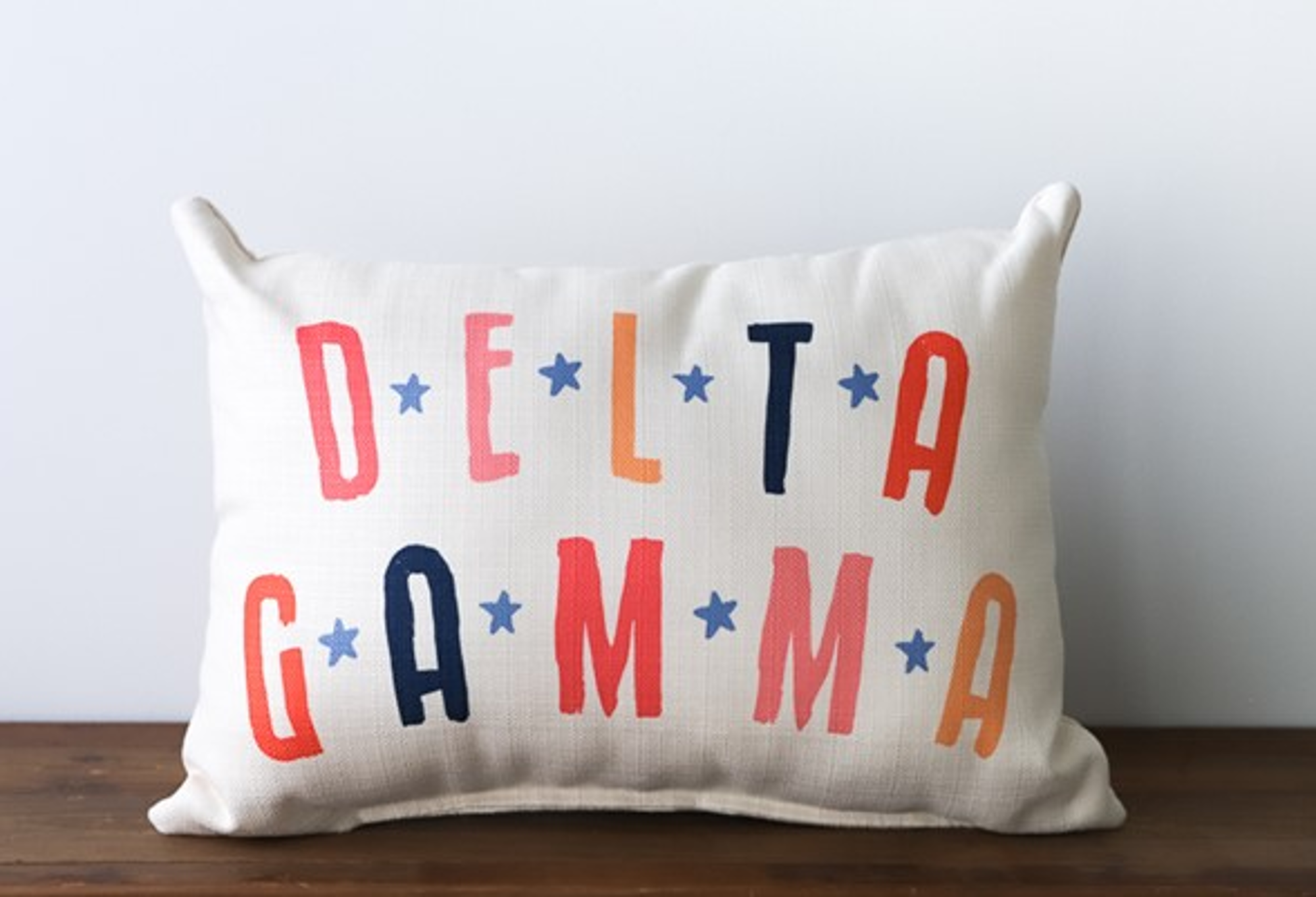 image of: Delta Gamma Pillow with Arched Stars